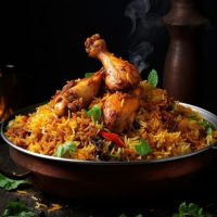 Indian chicken biryani food plate meat.